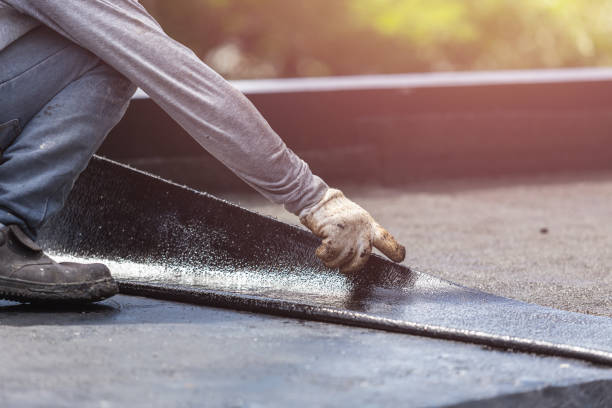 Professional Waterproofing technician working in Oxford, KS